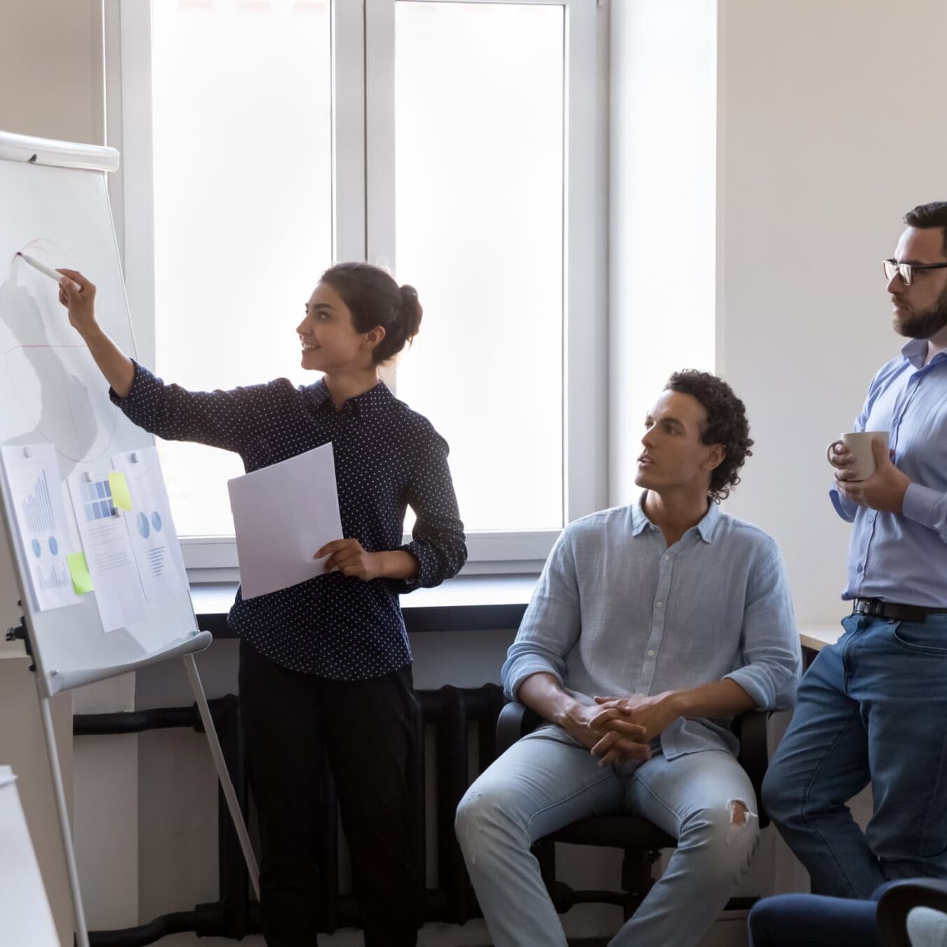 icf-credentialing-performance-evaluations-growing-more A group goes over performance evaluations to see where they can grow.