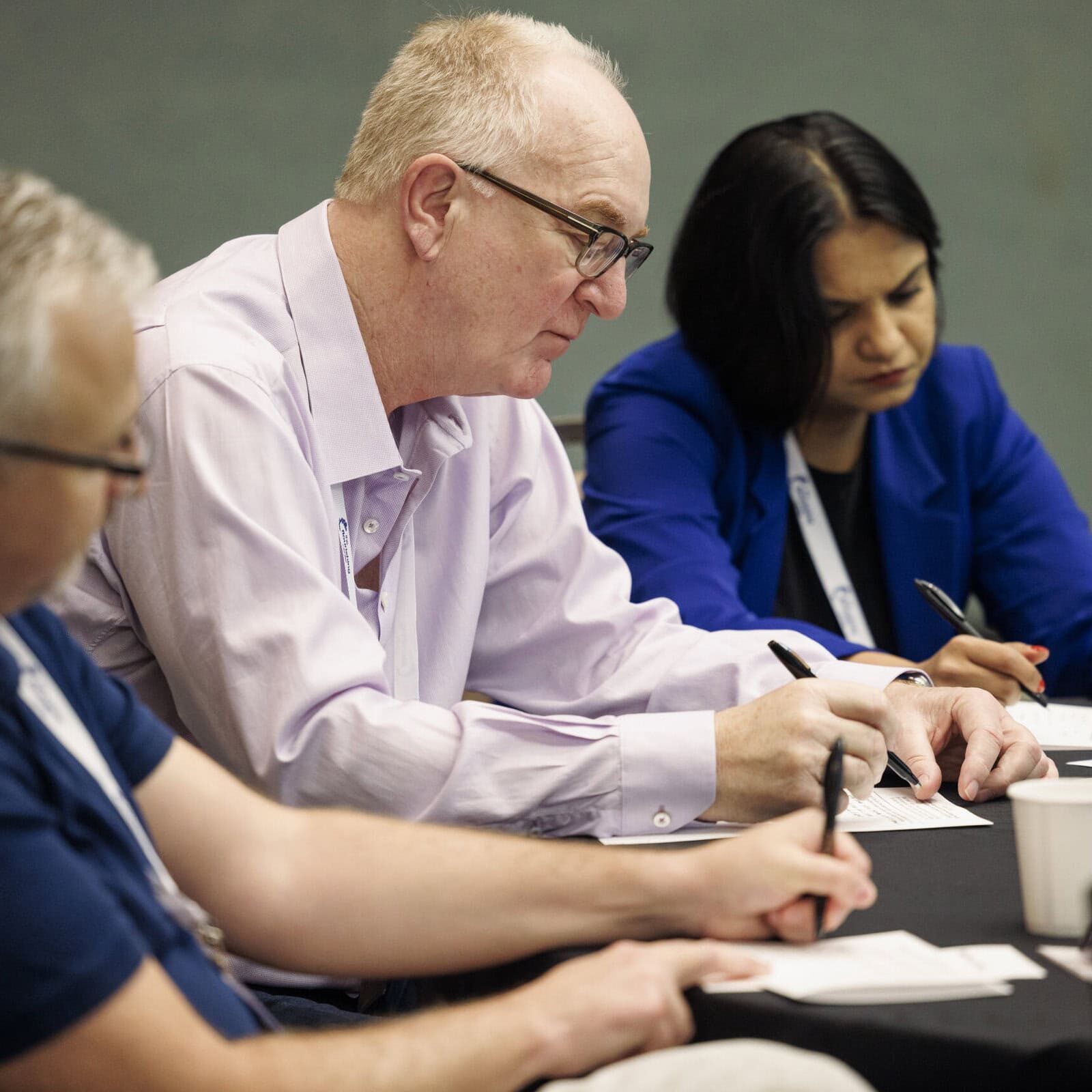 icf-event-coaching-week-workshop Speaker presenting at an ICF Coaching Week event, discussing the impact of coaching on personal and professional development.